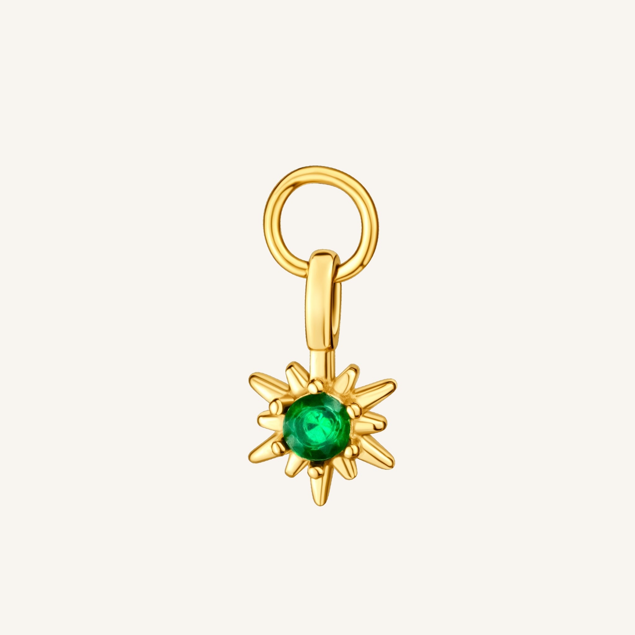 Emerald Sun Charm